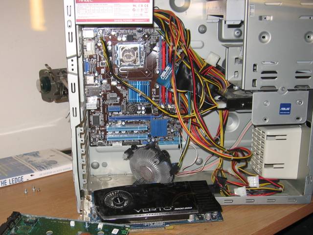 Just... just a mess of wire and parts. The inside of a computer, with some parts generally not being where they're supposed to be.