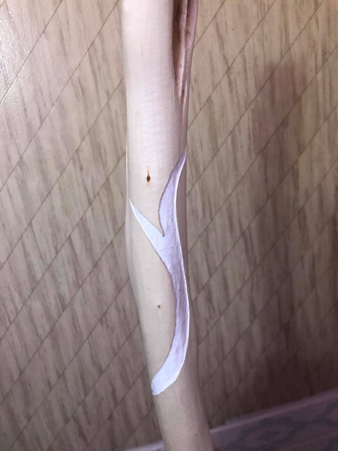 Showing more of the white linework, on a white staff. It's very Gandalf feeling, very good aligned.