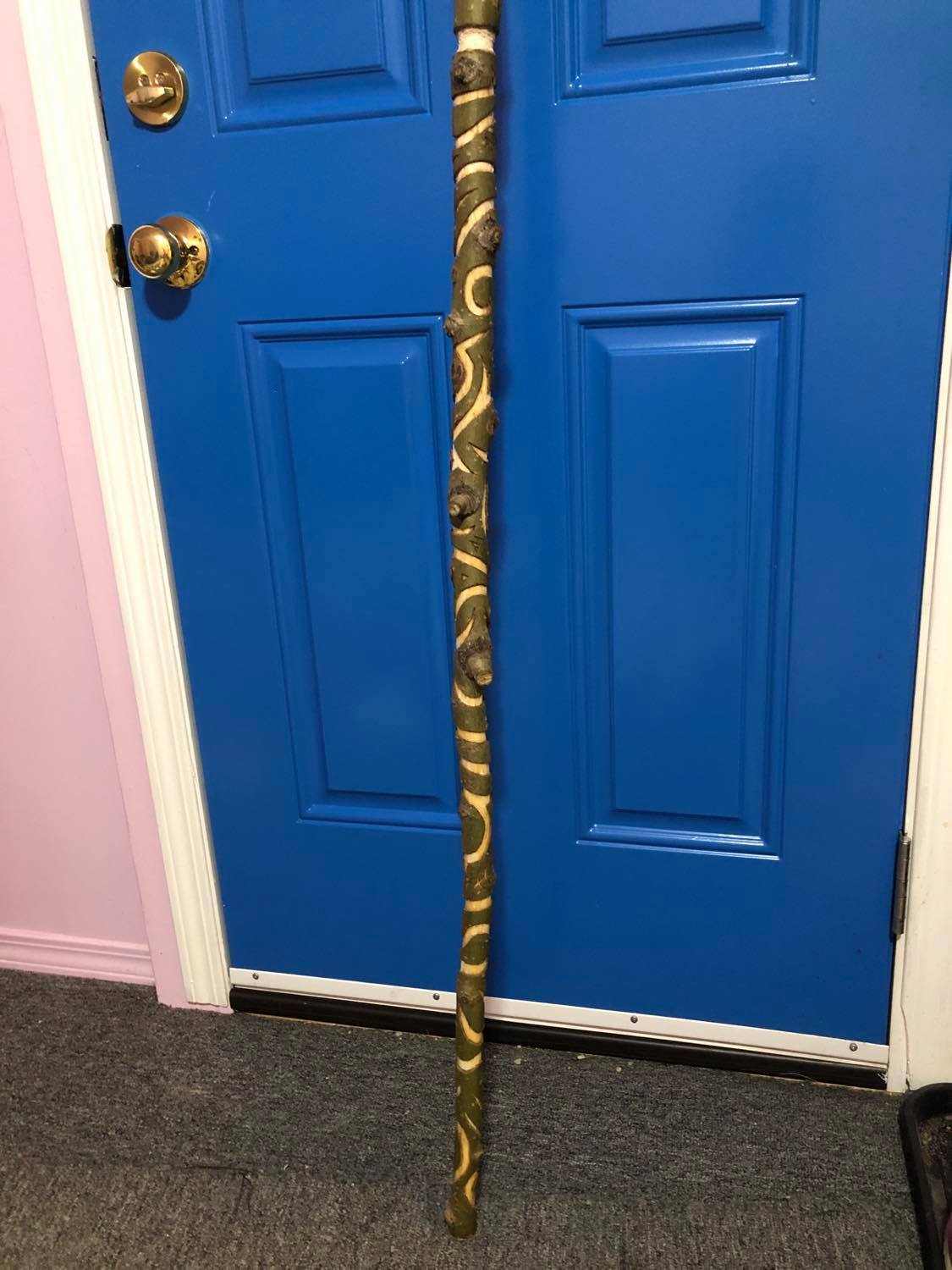 The same bottom of the staff, but rotated to show a different part of the linework.