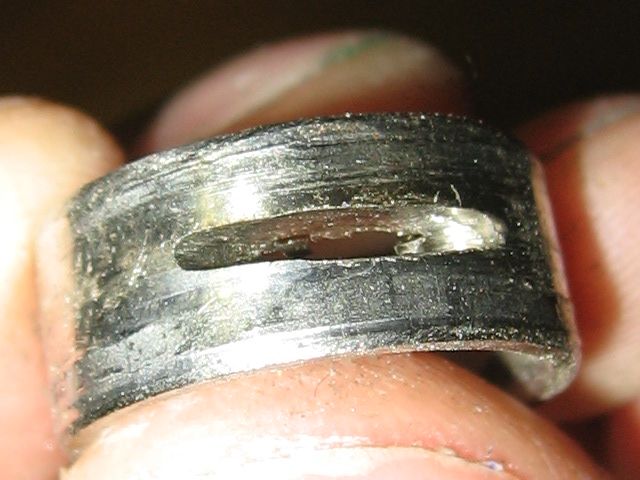 A closeup of the wider slot cut into the ring.