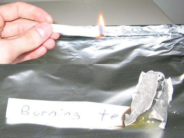 A strip of paper, with a little flame on the end, and then a closeup of the paper strip after it was put out.