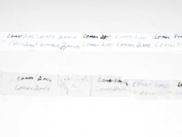 The two papers, with the regular paper heavily bleeding the text, and is barely holding together.