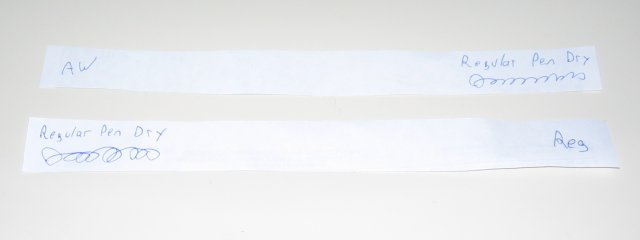 A sample of either paper with pen on it, saying regular pen dry on each.