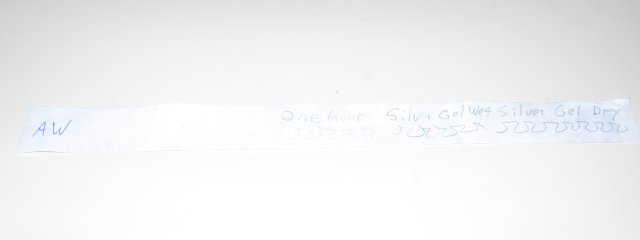 A very faded silver gel pen on the test strip.