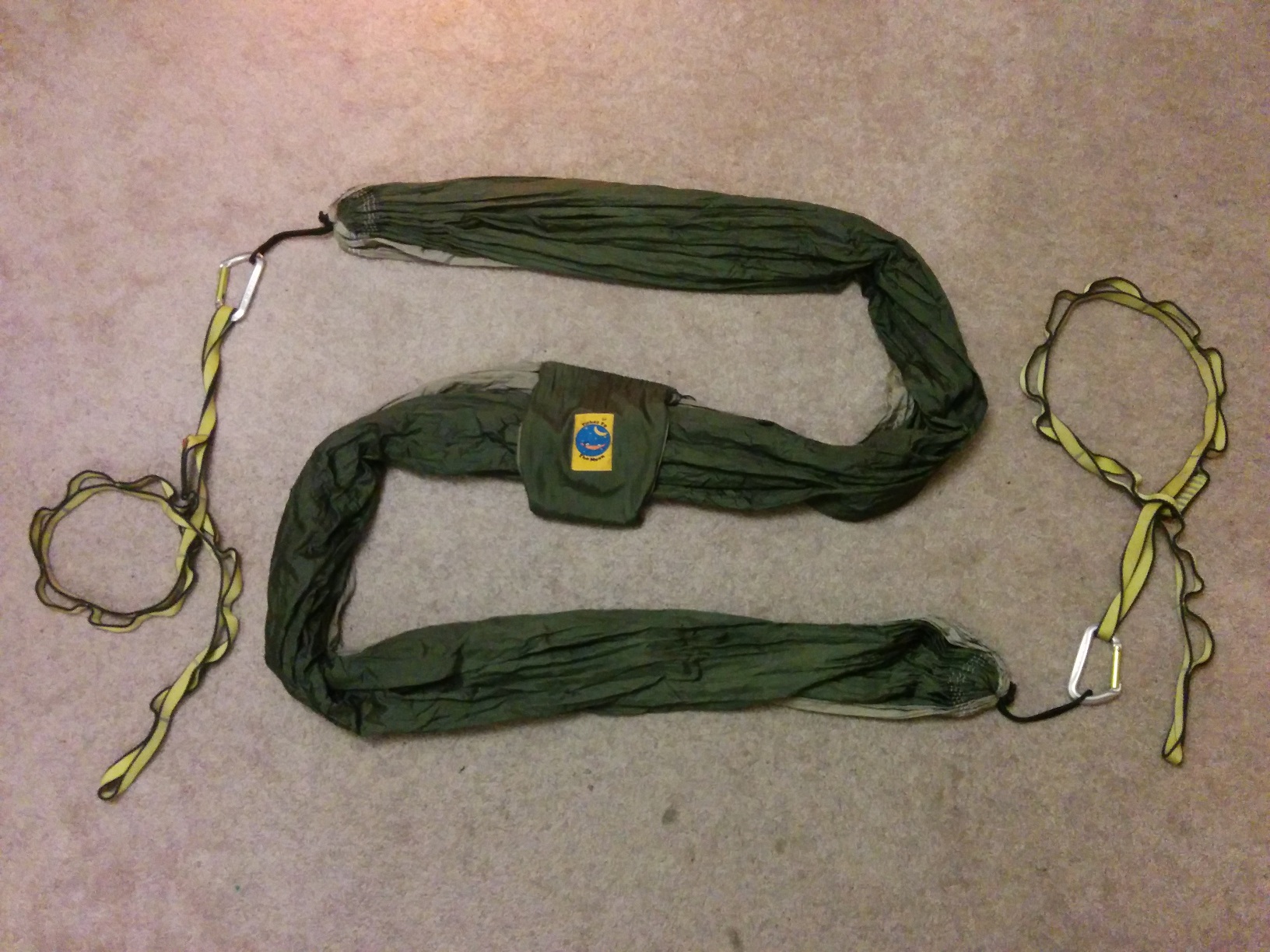 The hammock with two daisy chains attached, kinda zigzagging around to fit in the photo.