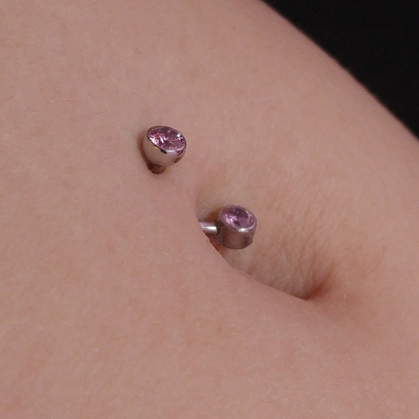 Her bellybutton piercing, pink
