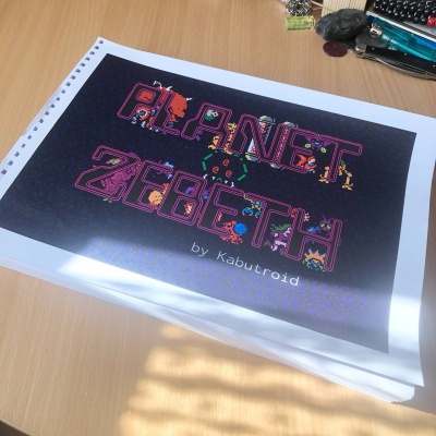 A thick ream of paper with Planet Zebeth proudly across the cover, glowing in the sunlight.
