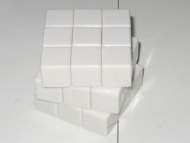 The cube assembled, with each layer rotated slightly.