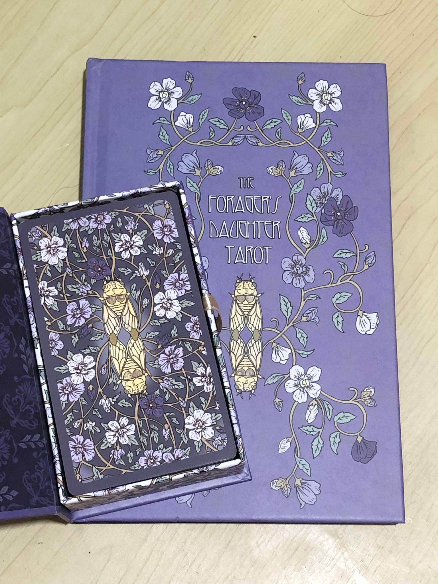 The Forager's Daughter Tarot, picked up because the idea of foraging people called to me so much, not from foraging per-se, but from having grown up on a farm with a family garden. We did also forage at our grandmother's house too.