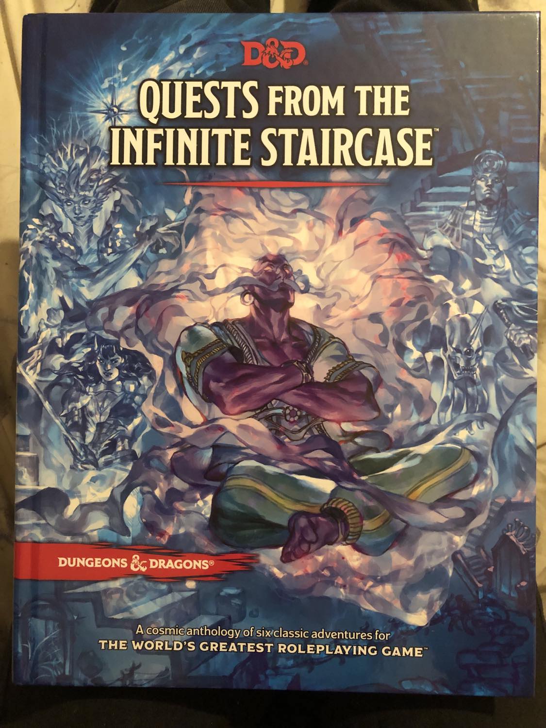 The book Quests from the Infinite Staircase, sitting on Kabutroid's lap, a blue book showing the planar winds blowing through the doors of the infinite staircase, with the genie Nafas, a purple being with a long moustache, seated regally, hearing the wishes of adventurers seen amongst the winds.