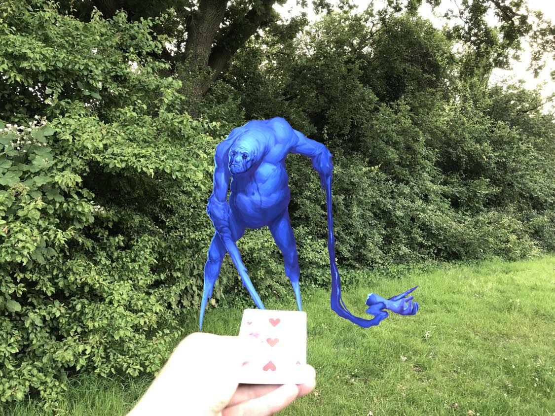 The three of hearts is pointed at the monster, who is now frozen blue.